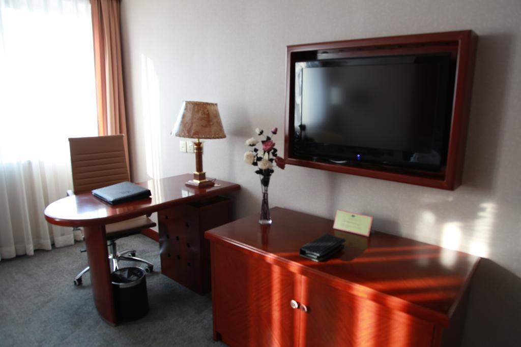 New Gloria Plaza Garden Hotel Χαρμπίν Δωμάτιο φωτογραφία