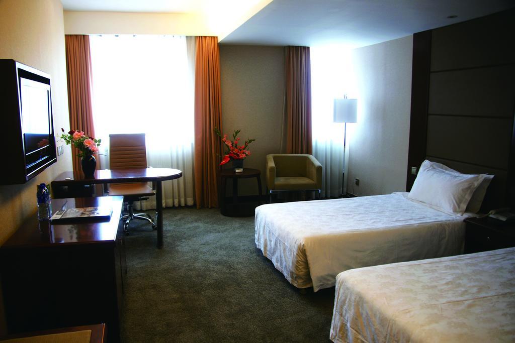 New Gloria Plaza Garden Hotel Χαρμπίν Δωμάτιο φωτογραφία