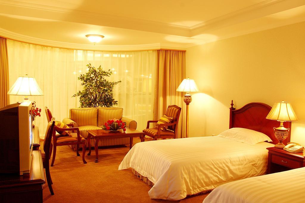 New Gloria Plaza Garden Hotel Χαρμπίν Δωμάτιο φωτογραφία