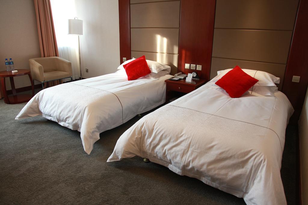 New Gloria Plaza Garden Hotel Χαρμπίν Δωμάτιο φωτογραφία
